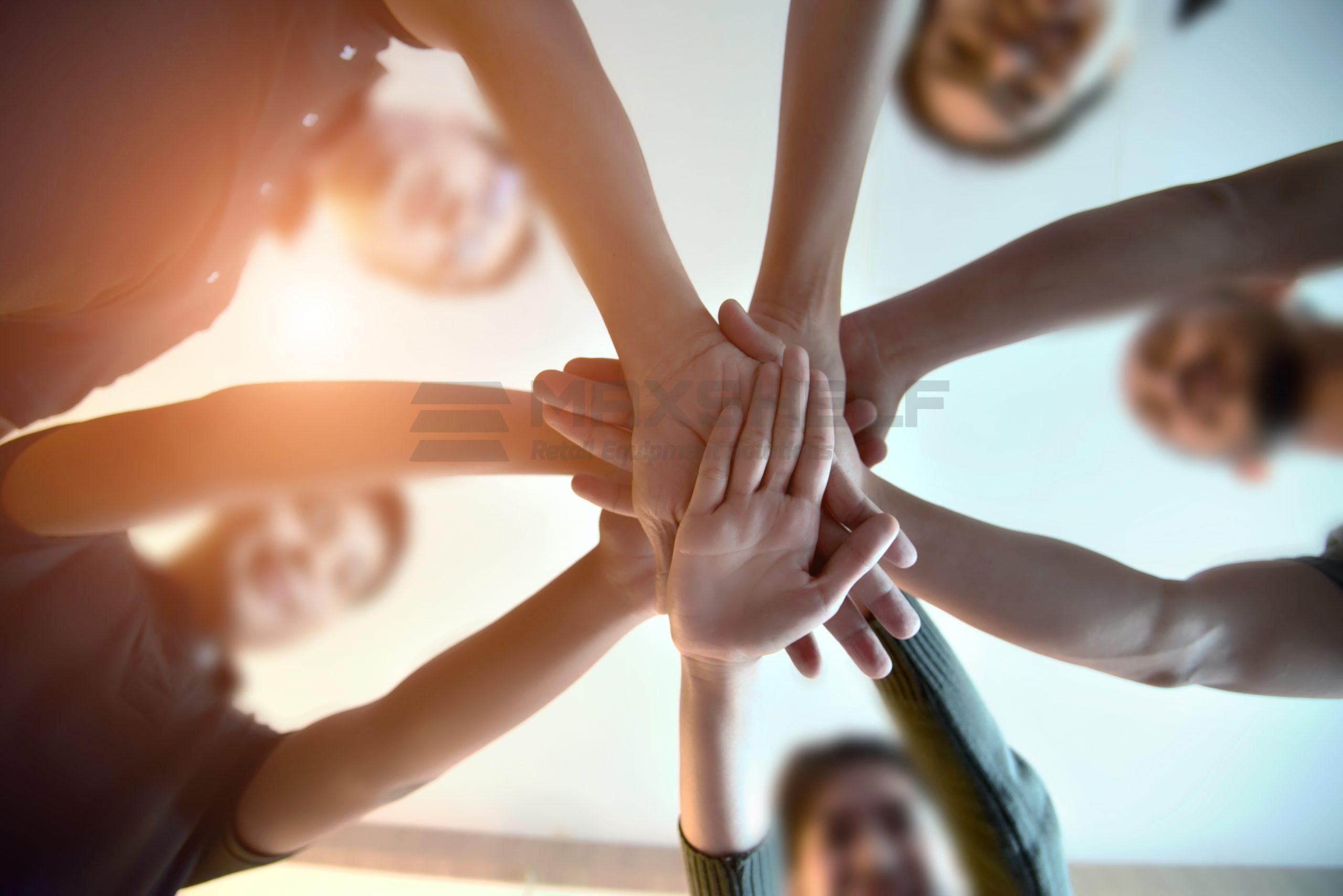 Young,Group,Are,Join,Hands,For,Working,The,Job,Success